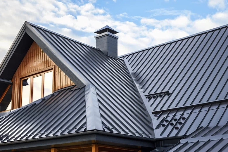 Worn curling asphalt shingles Asphalt shingles curling and lifting from age and UV damage
