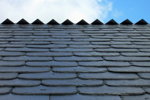 Vent pipe boot flashing sealed on an asphalt shingle roof