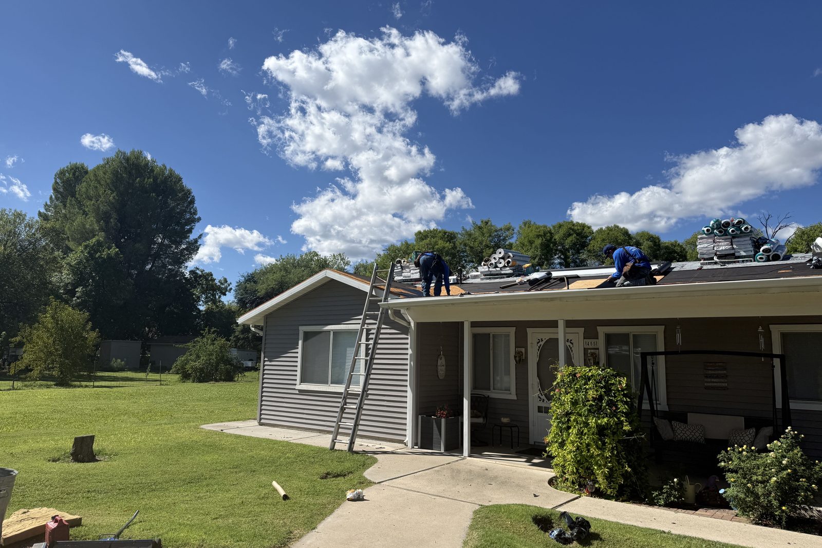 Crew on roof during replacement Enviro Pro crew on the roof of a Northern Arizona home during a roof replacement