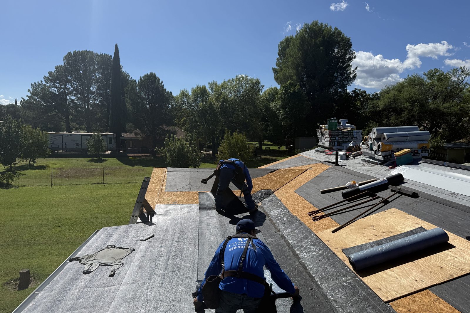 Prepping the roof deck Enviro Pro roofers prepping a roof deck for new underlayment and shingles
