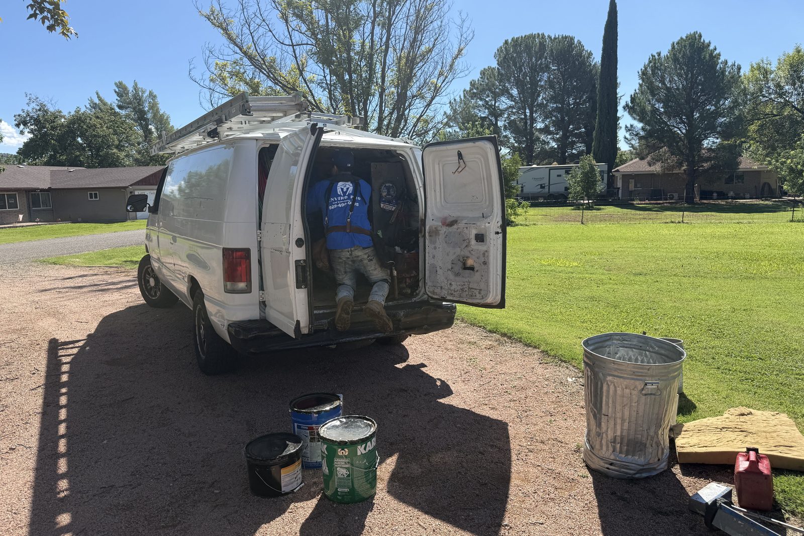 Enviro Pro van and crew Enviro Pro work van and crew at a roof replacement job site